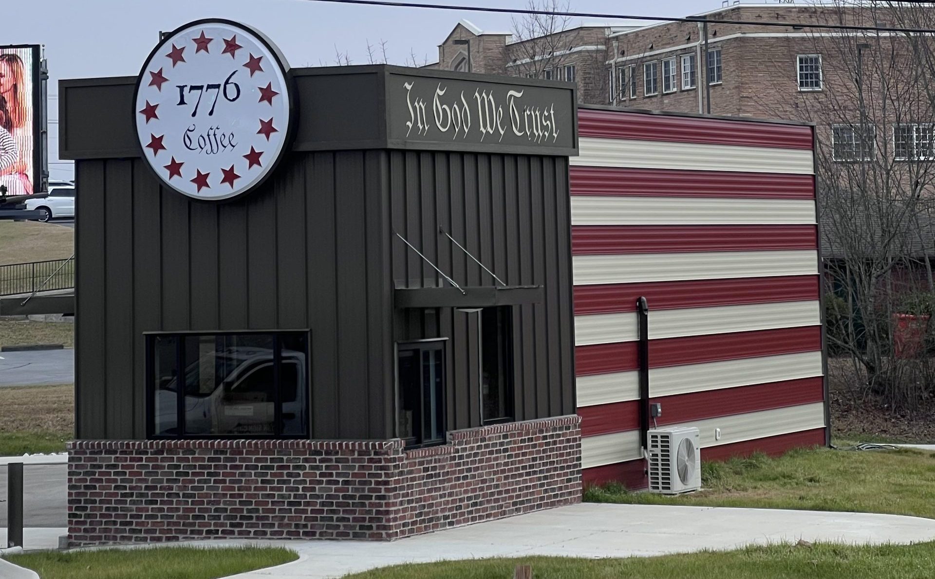 Image of Patriotic Drive Thru Coffee Shop in Crossville, TN with American Flag on side of the building
